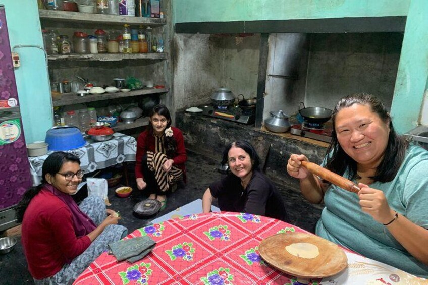 Guests from China and Italy joining in to prepare traditional Bangladeshi dishes, embracing local culture at Charubala Homestay 3