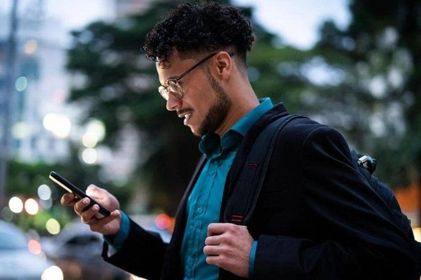 A person holding a smartphone. 3