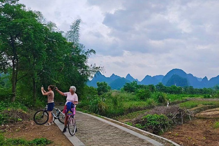 Yangshuo Gems Li River Boat Xianggong Hill and Yulong Biking 2