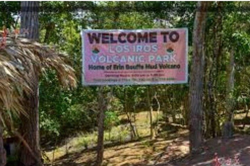 A sign welcoming visitors to Losrios Volcanic Park, home of Brin Beach Mud Volcano. 2