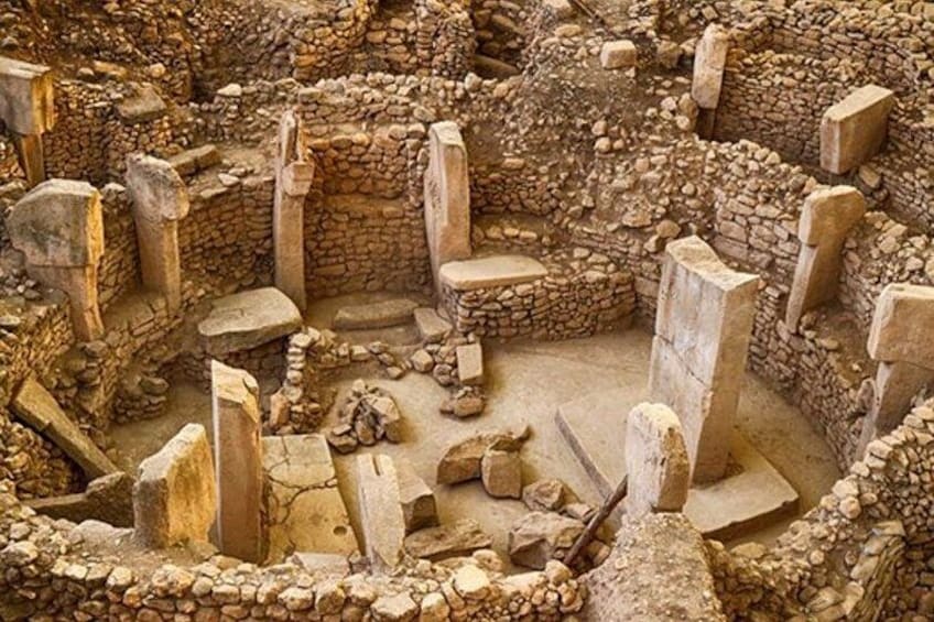 Ancient ruins with stone columns and walls. 1