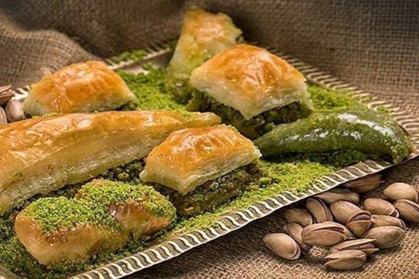 Baklava pieces on a plate with pistachios. 2