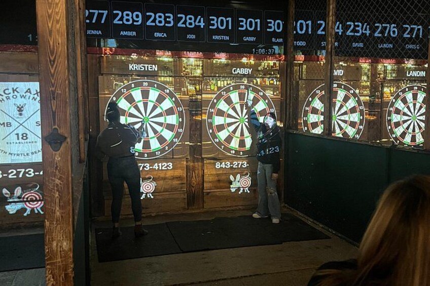 A dartboard with scores, a dartboard with scores, and a dartboard with scores. 5