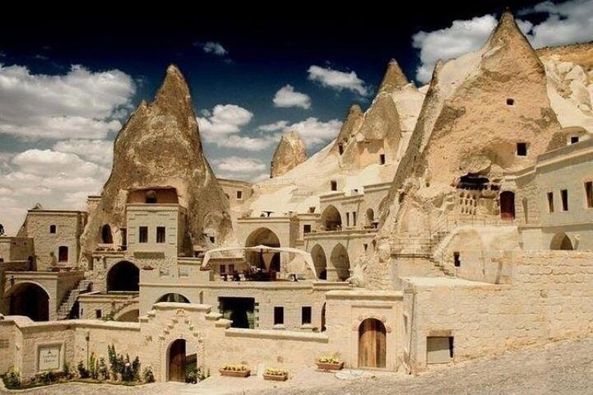 A village with unique rock formations and traditional architecture. 3