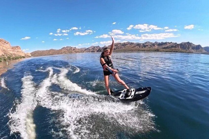 Loving the sun on her skin and the water flying by on the netsurf! 5