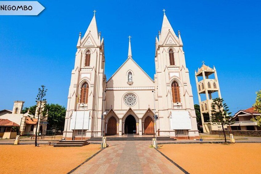 A large church with two towers and a central dome. 1