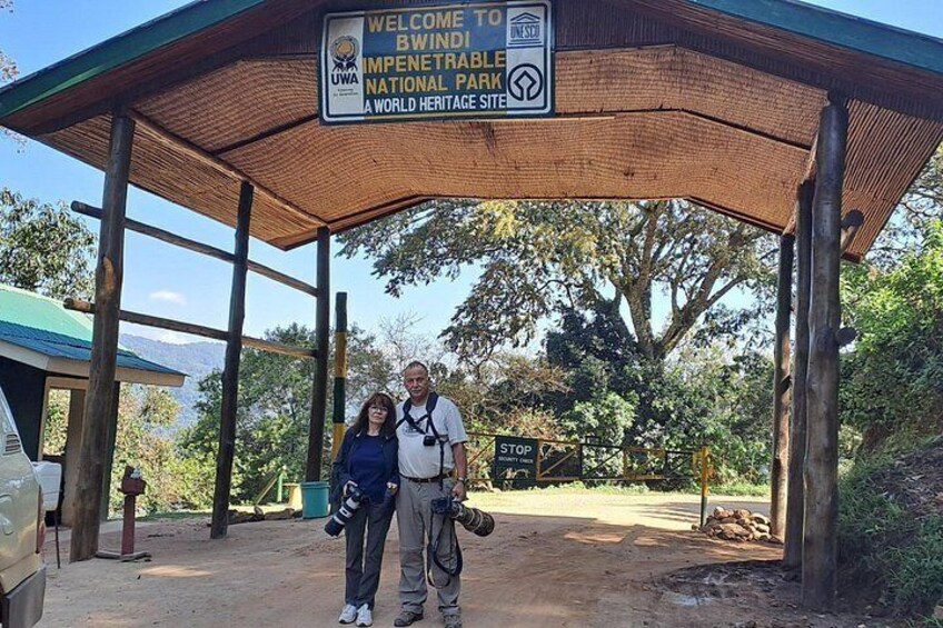 A wooden shelter with a sign welcoming visitors to Bwindle National Park, a World Heritage Site. 2