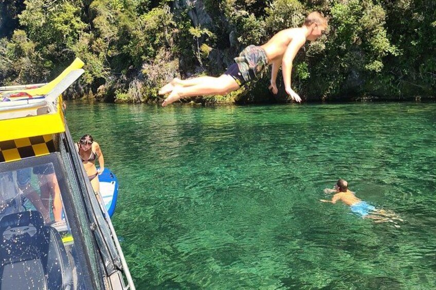 Swimming and paddle boarding inTe Papa Bay 5