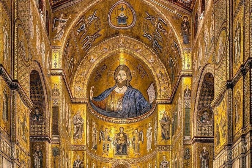 A richly decorated interior with golden mosaics, a central figure, and intricate architectural details. 1