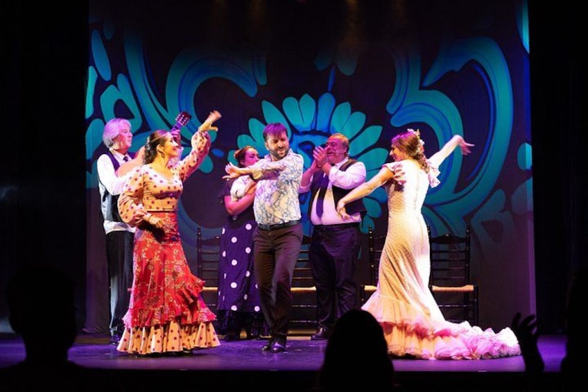 A stage performance with actors in colorful costumes. 2