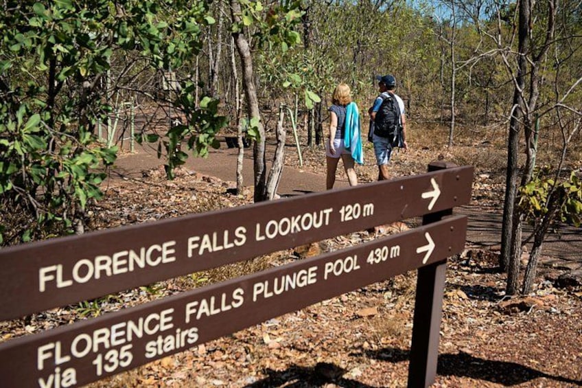 A hiking trail sign with directions to Florence Falls Lookout and plunge pool, and a path via 135 stairs. 3