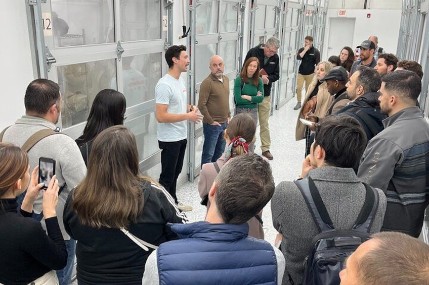 FOUNDER, JOE WEBER EXPLAINS TO GUESTS HOW A CONTROLLED ENVIRONMENT FACILITY IS USED TO GROW MUSHROOMS 1