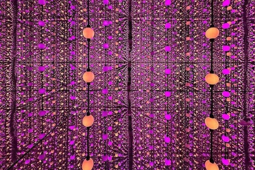 A complex pattern of interconnected lines and circles, predominantly in shades of purple and orange. 3