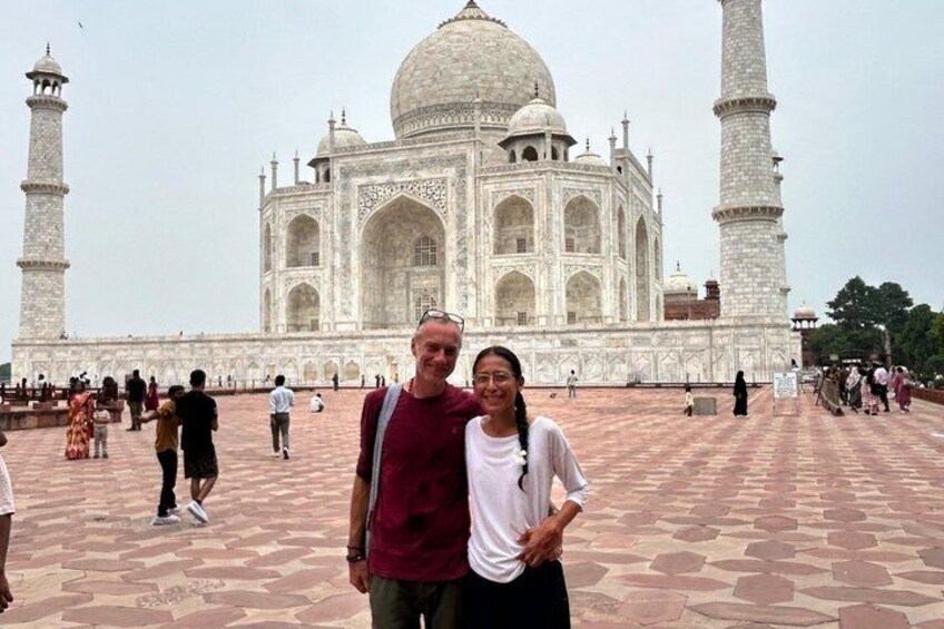 The Taj Mahal with a couple in the foreground. 3