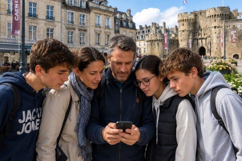 A group of people looking at a smartphone, with historic buildings in the background. 2