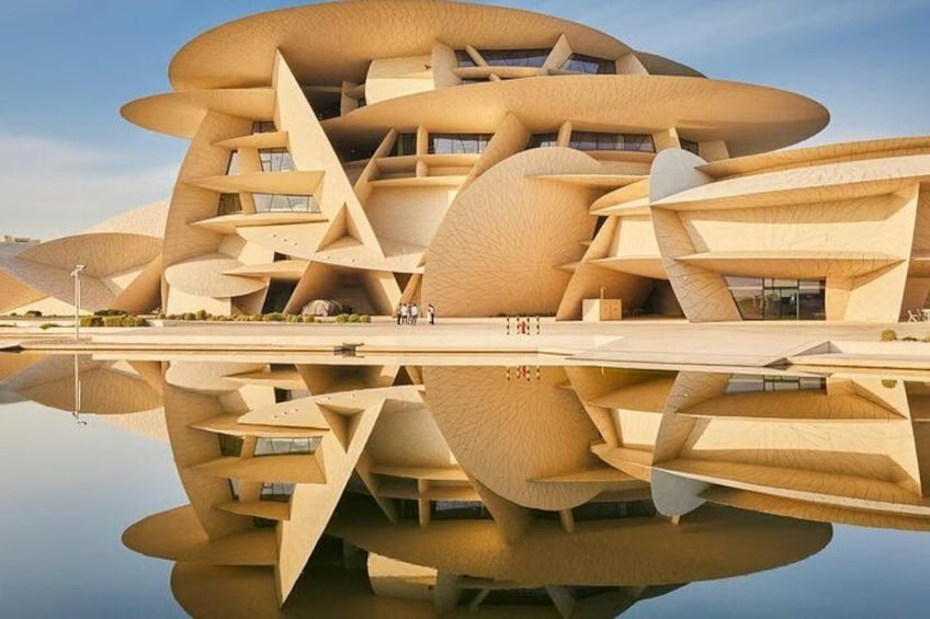 A modern architectural building with a unique, layered design. 3