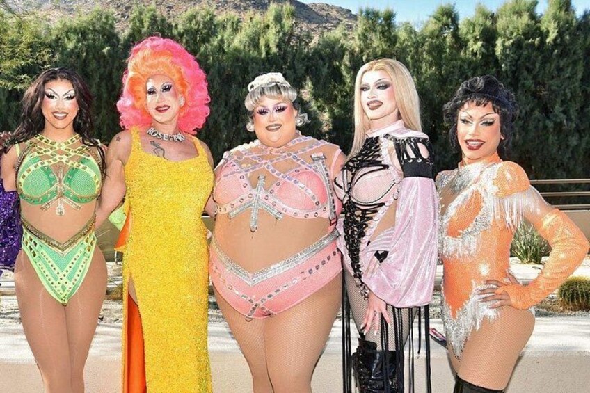 A group of people in colorful costumes. 2