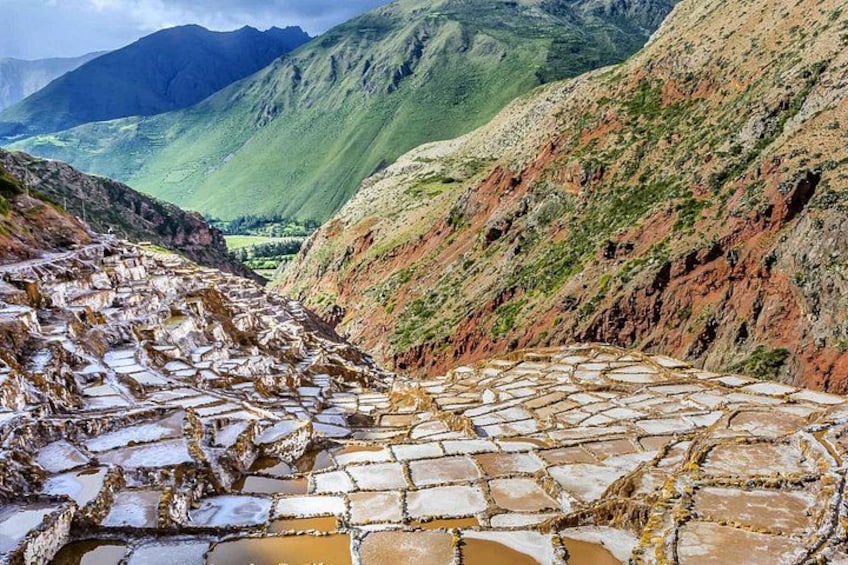 Terraced stone steps leading down a mountainous valley. 4