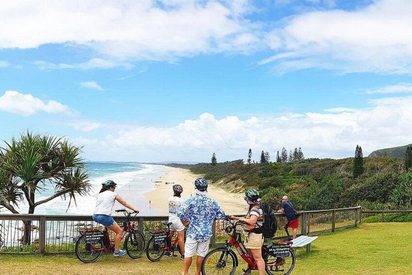 Easy Peasy Novotel North e-Bike Tour: Riders Enjoy Coastal Views from Pt Arkwright with Mt Coolum and Coral Sea Surf 5