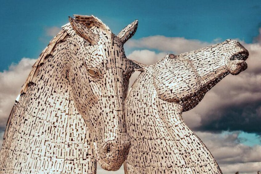 A large sculpture of two horses made of bricks. 2
