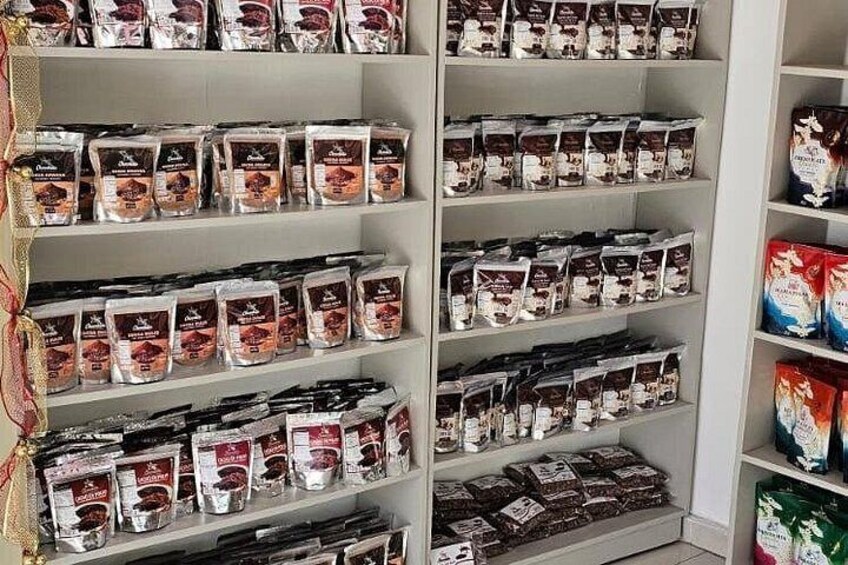 Shelves stocked with various packaged food items. 1