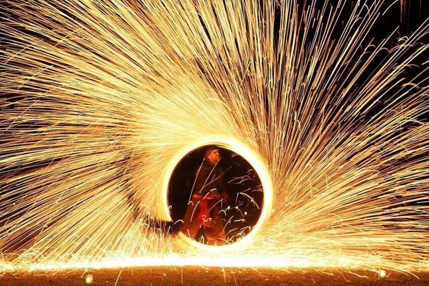 A circular opening with sparks flying outward. 5
