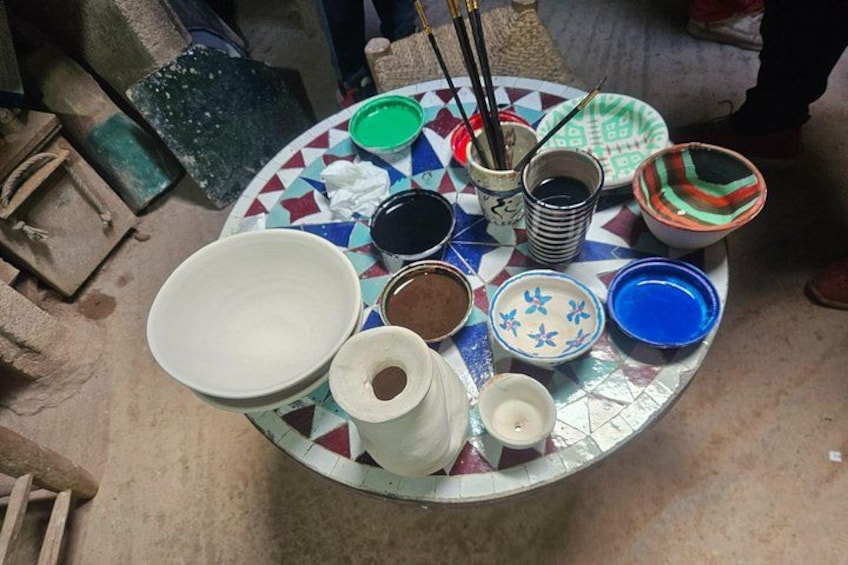 A round table with various dishes and bowls. 2