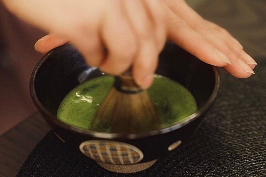 Hands-on matcha preparation using authentic tea ceremony utensils 3
