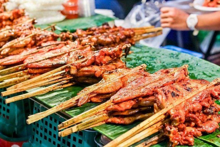 Grilled skewers of meat on a table. 3