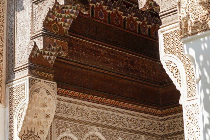 Intricate architectural details with geometric patterns and arches. 5