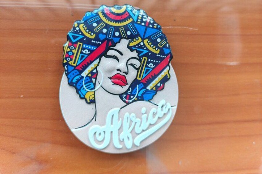 A round object with a colorful design and the word 'Africa' on it. 3