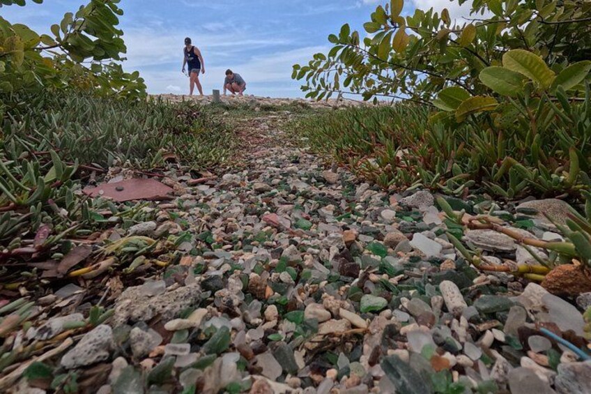 A rocky path with people walking. 3