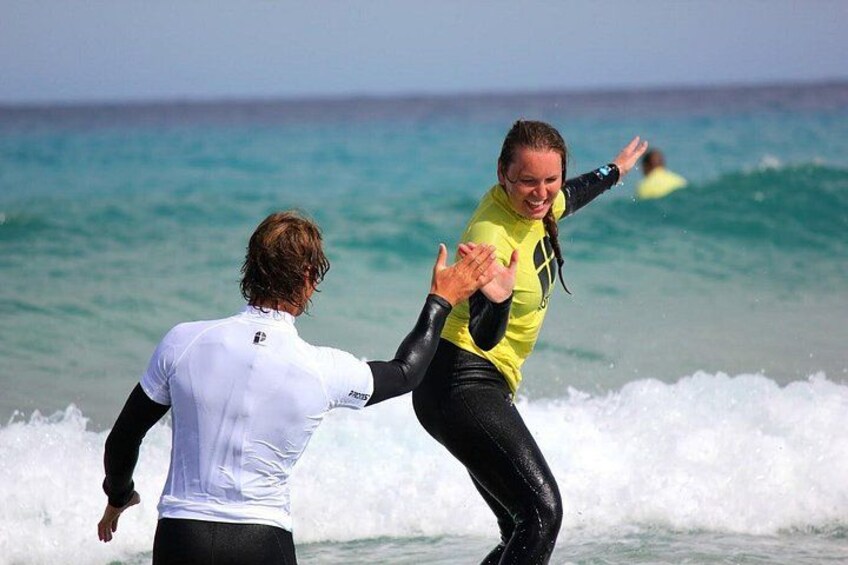 Learn to surf the most beautiful sandy beaches of Fuerteventura 1