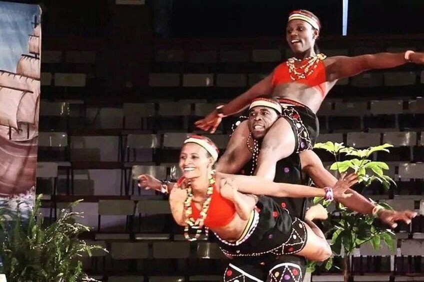 A person performing an acrobatic stunt with another individual. 2