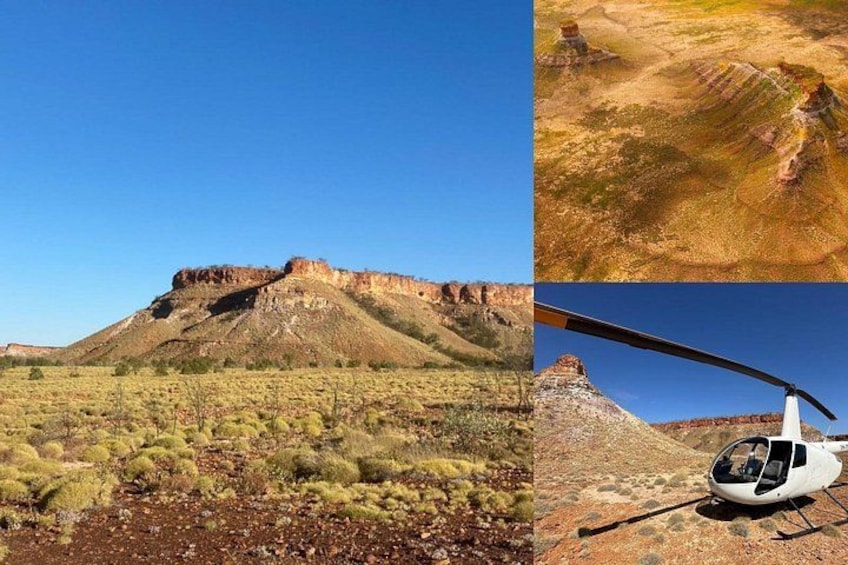 A desert landscape with a prominent hill, sparse vegetation, and a helicopter. 1