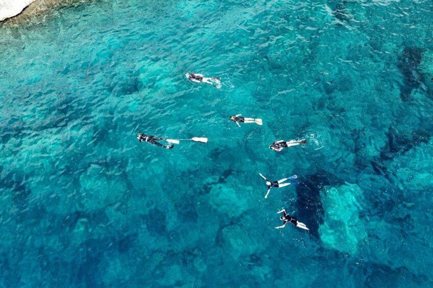 San Teodoro: sunset snorkeling at Molara Pools with sea scooter 4