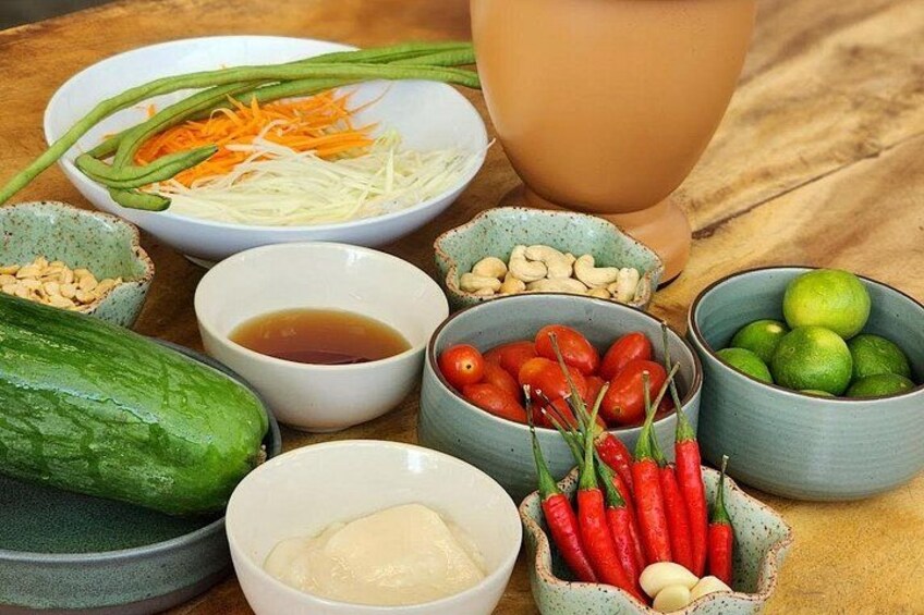 A table with various food ingredients and condiments. 4