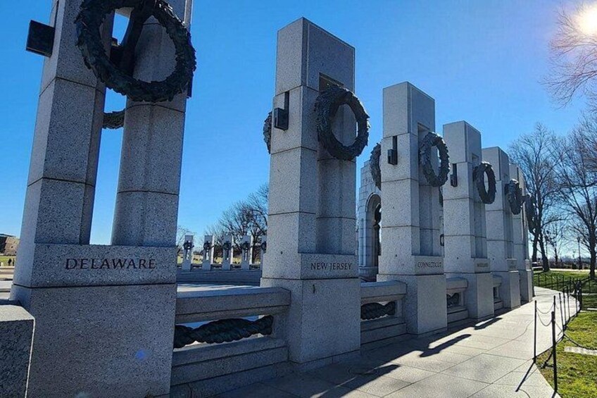 A memorial with columns labeled 'Delaware,' 'New Jersey,' and 'Connecticut.' 2