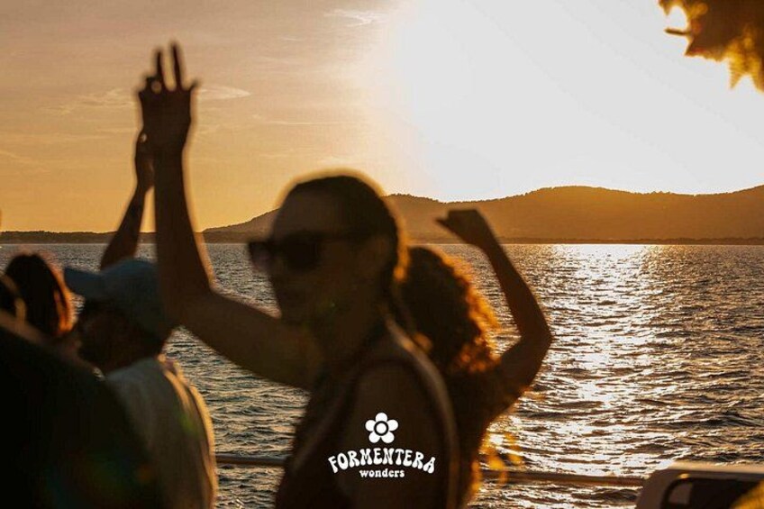 Ibiza: Formentera Boat Trip with Open Bar, Paella & Sunset Party 4