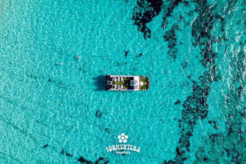 Ibiza: Formentera Boat Trip with Open Bar, Paella & Sunset Party 1
