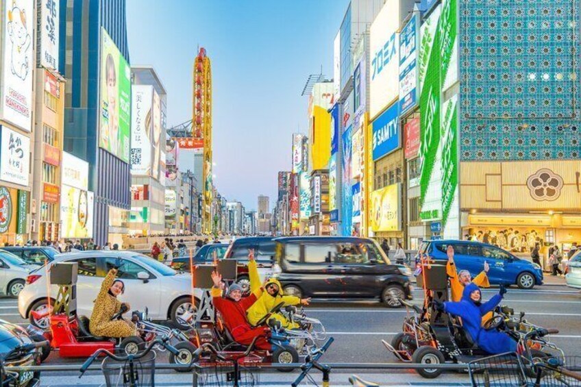 A busy urban street with bicycles and cars. 3