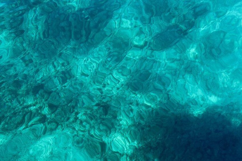 A clear underwater view with visible patterns and textures. 5