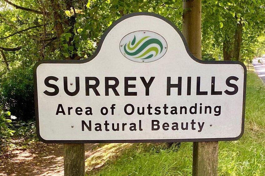 A sign for Surrey Hills, highlighting its natural beauty. 3