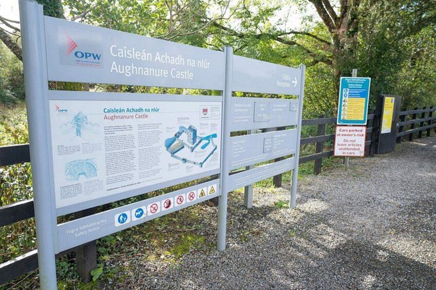 A signboard with information about Caislean Achadh na nIur Aughnanure Castle. 5