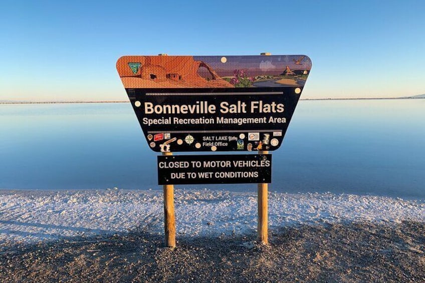 A sign at Bonneville Salt Flats Special Recreation Management Area indicating closure to motor vehicles due to wet conditions. 3