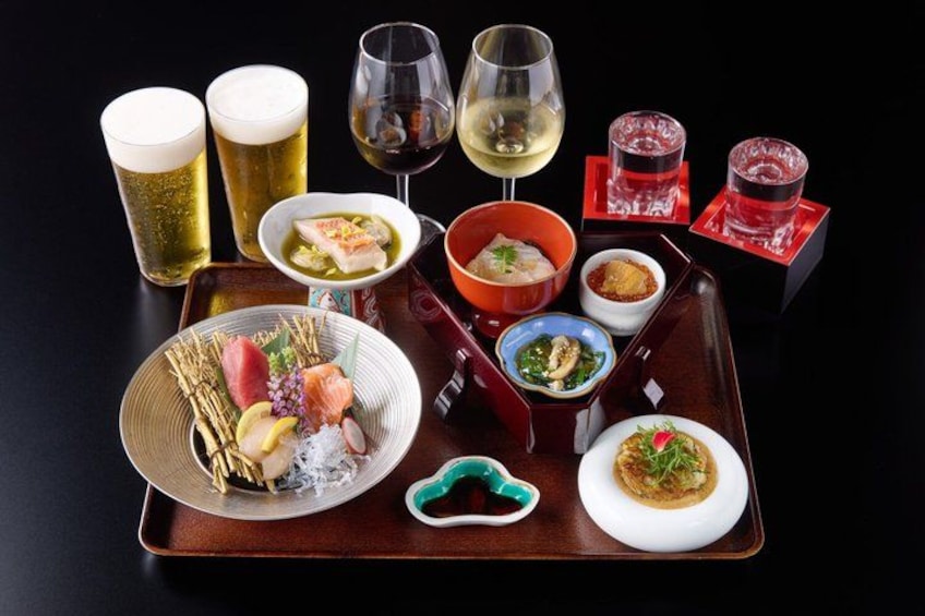 A variety of dishes and drinks on a tray. 5