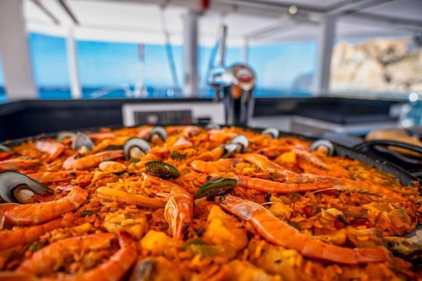 A seafood paella with shrimp and mussels. 4