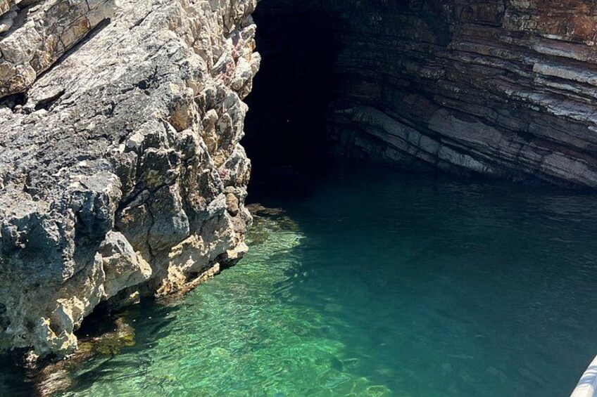 A rocky coastline with clear water. 5