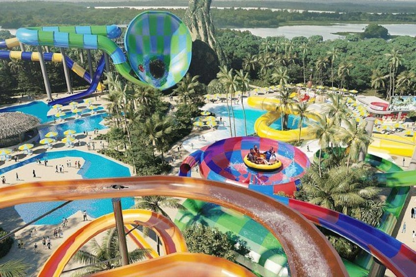 A water park with multiple slides and pools. 2