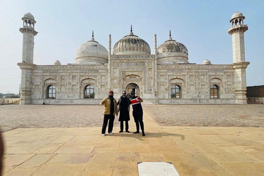 A large, ornate building with domes and minarets, likely a historical or religious site. 5